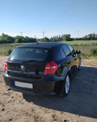 BMW Seria 1 cena 22900 przebieg: 210000, rok produkcji 2009 z Rawicz małe 172